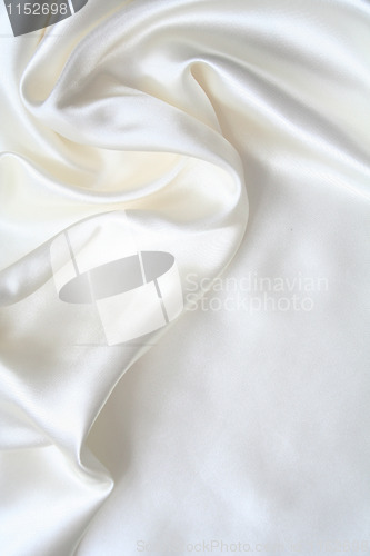 Image of Smooth elegant white silk as background 