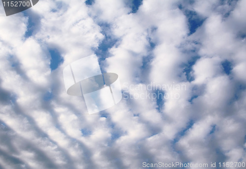 Image of Clouds in the blue sky as background 