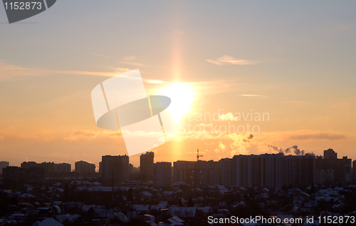 Image of sunset over a city.