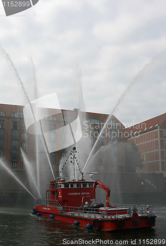 Image of Fireboat flush in the air.