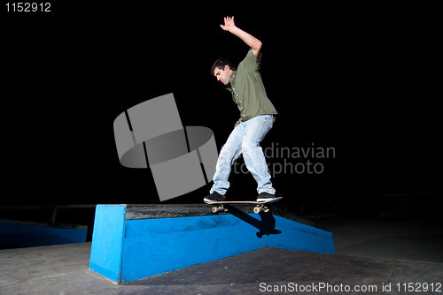 Image of Skateboarder on a slide