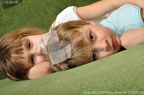 Image of tired children having rest 