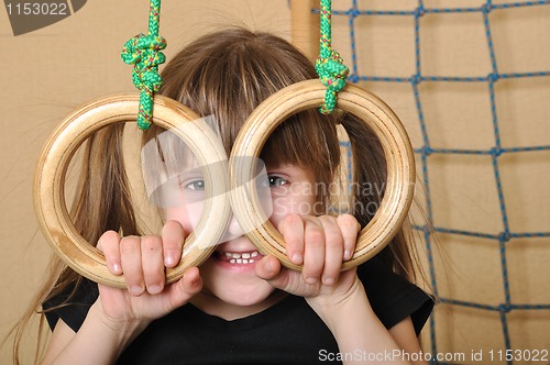 Image of child with gymnastic rings