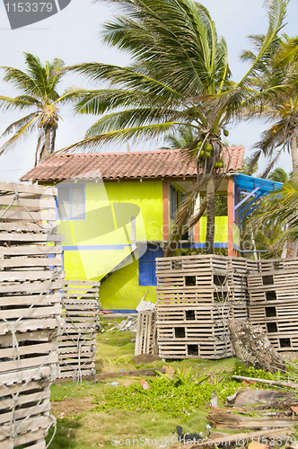 Image of fisherman's colorful house lobster traps