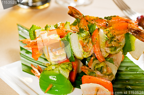 Image of shrimps and vegetables skewers