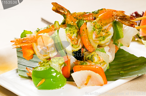 Image of shrimps and vegetables skewers