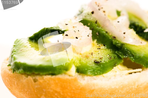 Image of Sandwich with avocado on a wooden board 