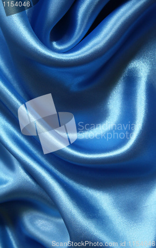 Image of Smooth elegant blue silk as background