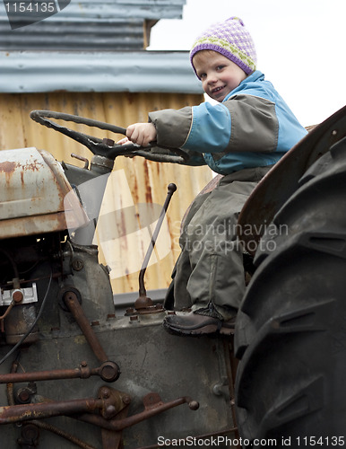 Image of Child on tractor