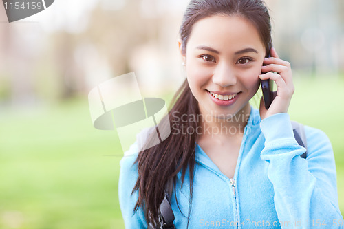 Image of Asian student on the phone