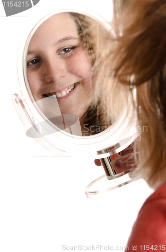 Image of Preteen Looking In Mirror