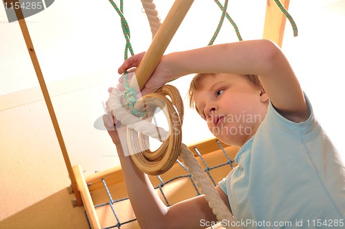 Image of child playing and exersicing at home