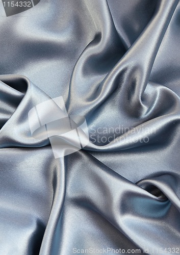 Image of Smooth elegant blue silk can use as background 