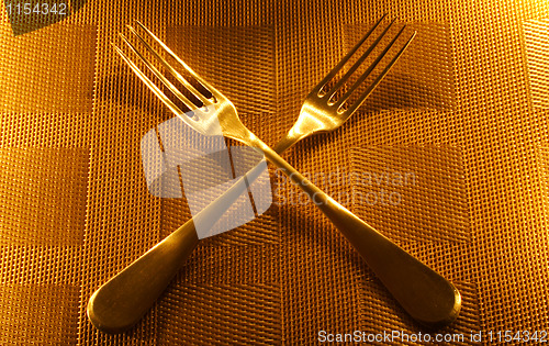 Image of two vintage silver forks