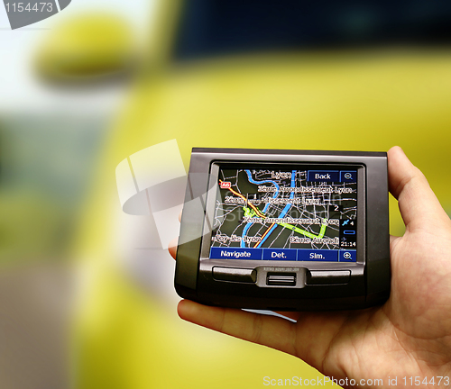 Image of Gps in a man hand.