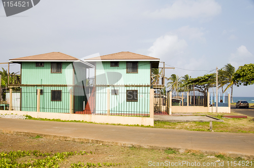 Image of matching box buildings seaside Corn Island Nicaragua