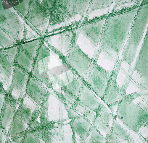 Image of Abstract watercolor background with green layers on paper 