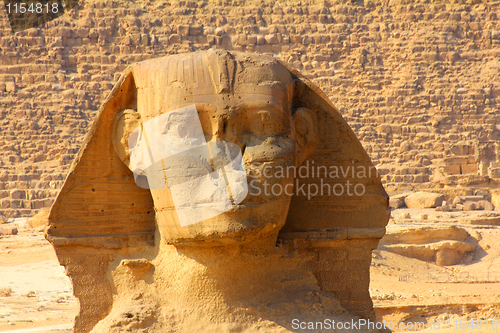 Image of egypt sphinx face and pyramid in Giza