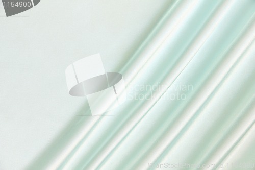 Image of Smooth elegant blue silk as background 