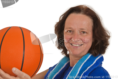 Image of Middle aged woman with basketball 