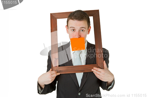 Image of Businessman with wooden frame