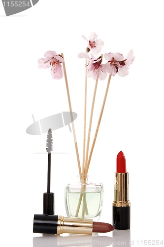 Image of cosmetics, parfume and flower