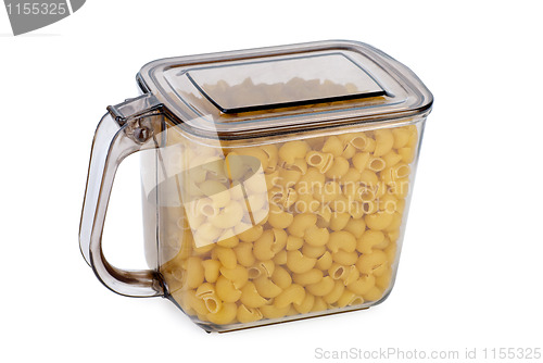 Image of Kitchen container ful of uncooked macaroni