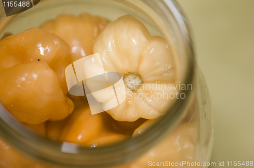 Image of jar of spicy hot peppers condiment Nicaragua food