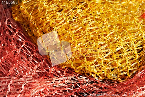 Image of Yellow and red plastic mesh