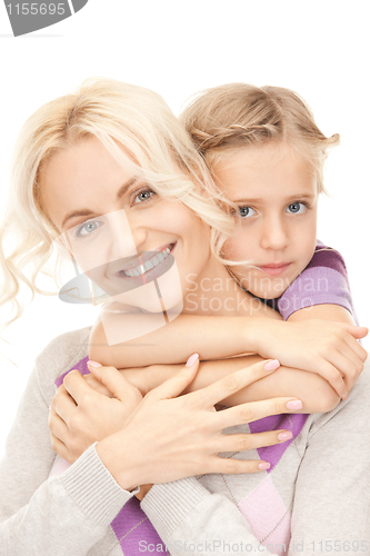 Image of happy mother and little girl