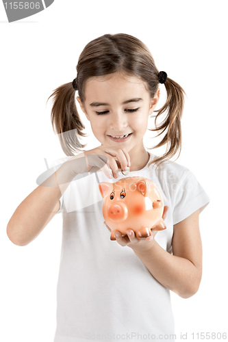 Image of Little girl with a piggy-bank