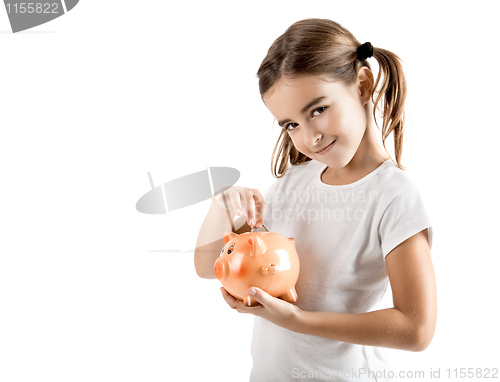 Image of Little girl with a piggy-bank