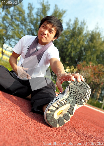 Image of man doing stretching exercise