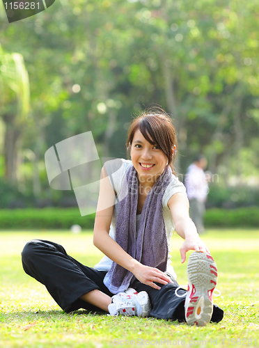 Image of woman doing stretching exercise