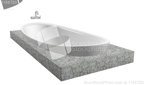 Image of White oval bath with chrome faucet, sitting on a granite slate