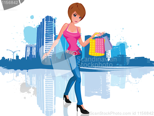 Image of Young woman with shopping bag in city