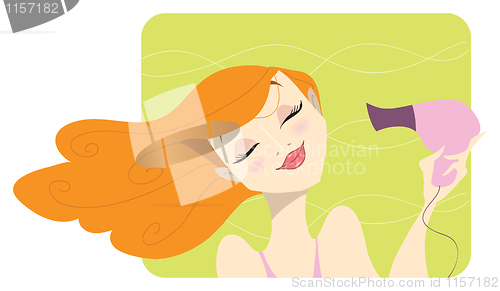 Image of Redhead woman drying her hair