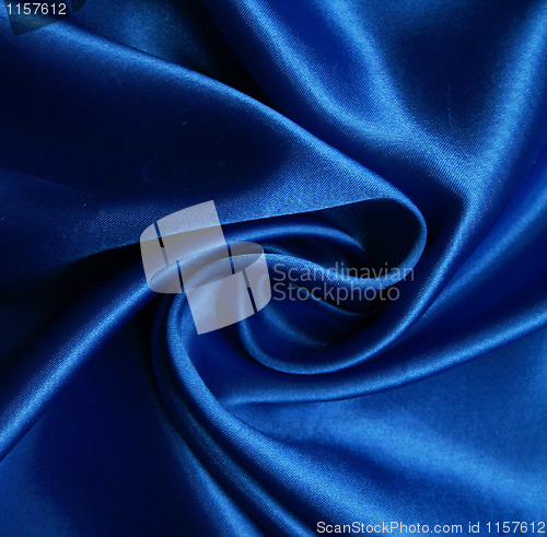 Image of Smooth elegant blue silk as background 