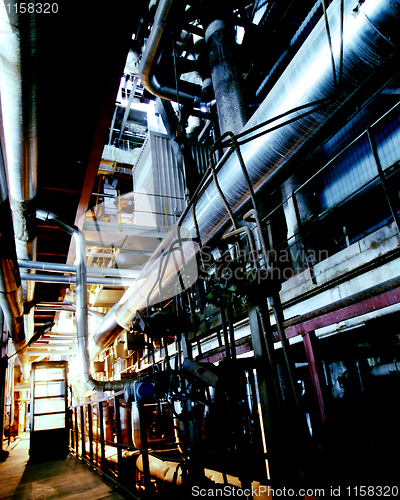 Image of Industrial zone, Steel pipelines in blue tones  