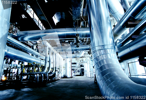 Image of Industrial zone, Steel pipelines in blue tones  