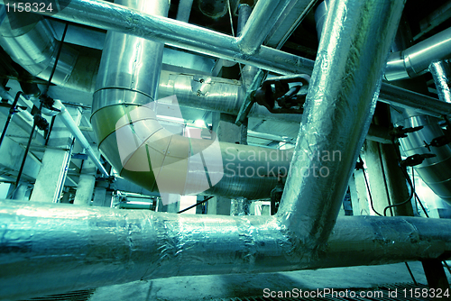Image of Industrial zone, Steel pipelines in blue tones  