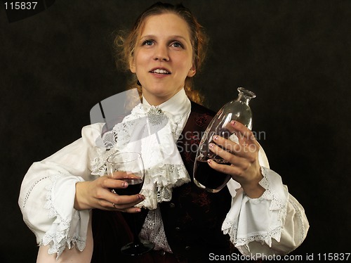 Image of Woman with cup of red wine