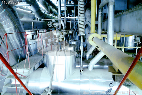 Image of Industrial zone, Steel pipelines in blue tones  