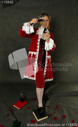 Image of Woman with cup of red wine