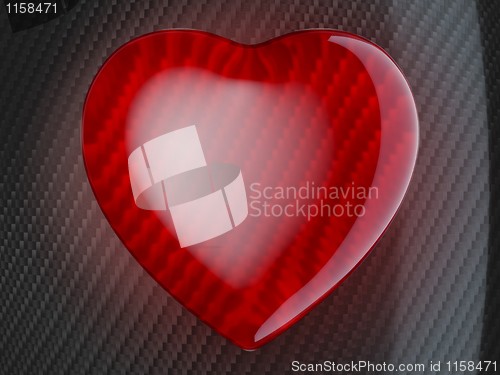 Image of Red heart shape on carbon fiber