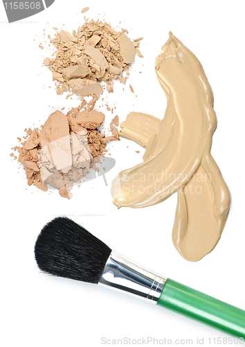 Image of Powder and foundation makeup with brush