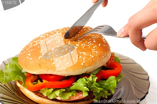 Image of Big hamburger on a plate meal time
