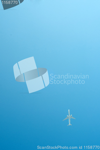 Image of Small airplane on blue sky