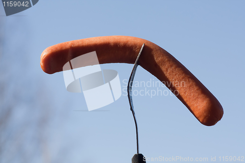 Image of Sausage on fork