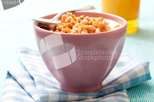 Image of Breakfast with cereal with orange juice